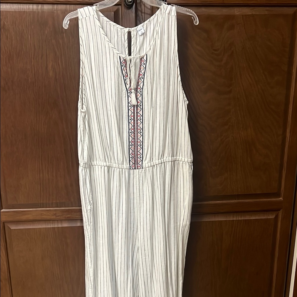 Sleeveless White Striped Jumpsuit with Embroidered Detail